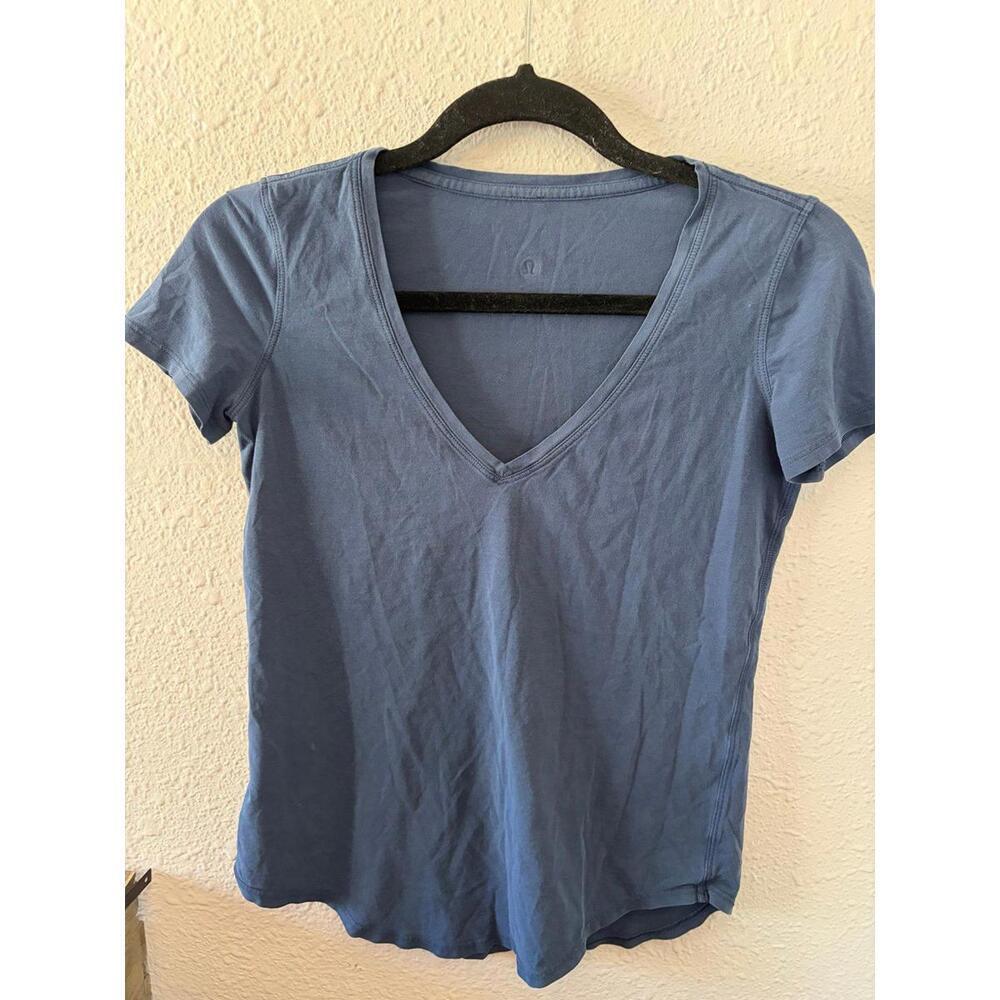 Lululemon love tee vneck waist length in mineral blue. Best for 2. Pinhole on sh